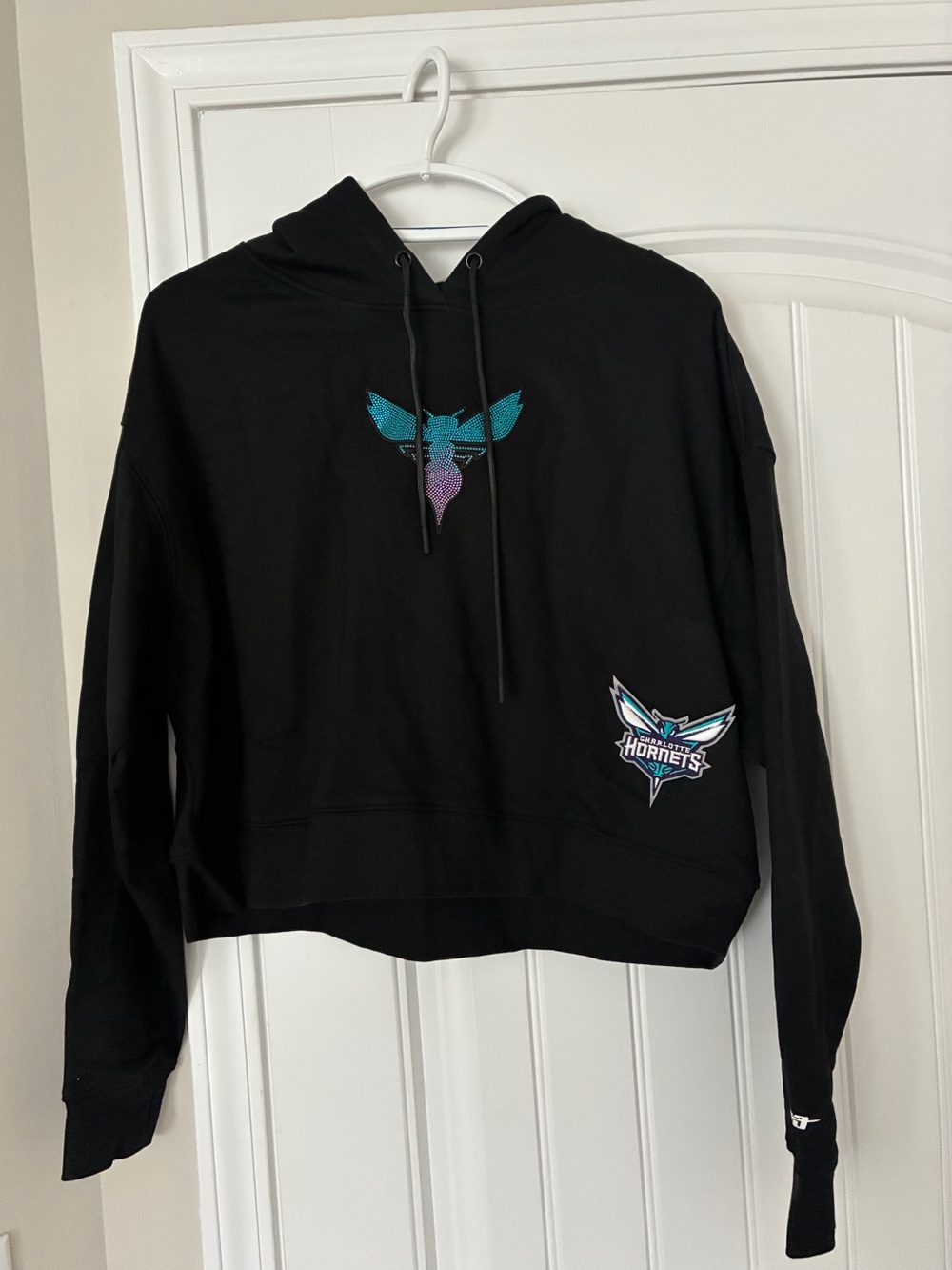 Charlotte Hornets Black Cropped Hoodie with Teal & Purple Logo